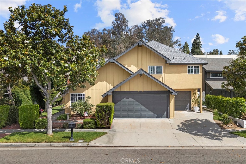 Front Of home. The single car garge is a pass through which leads to the backyard - 6263 E Northfield, Anaheim CA 92807 - photo 1