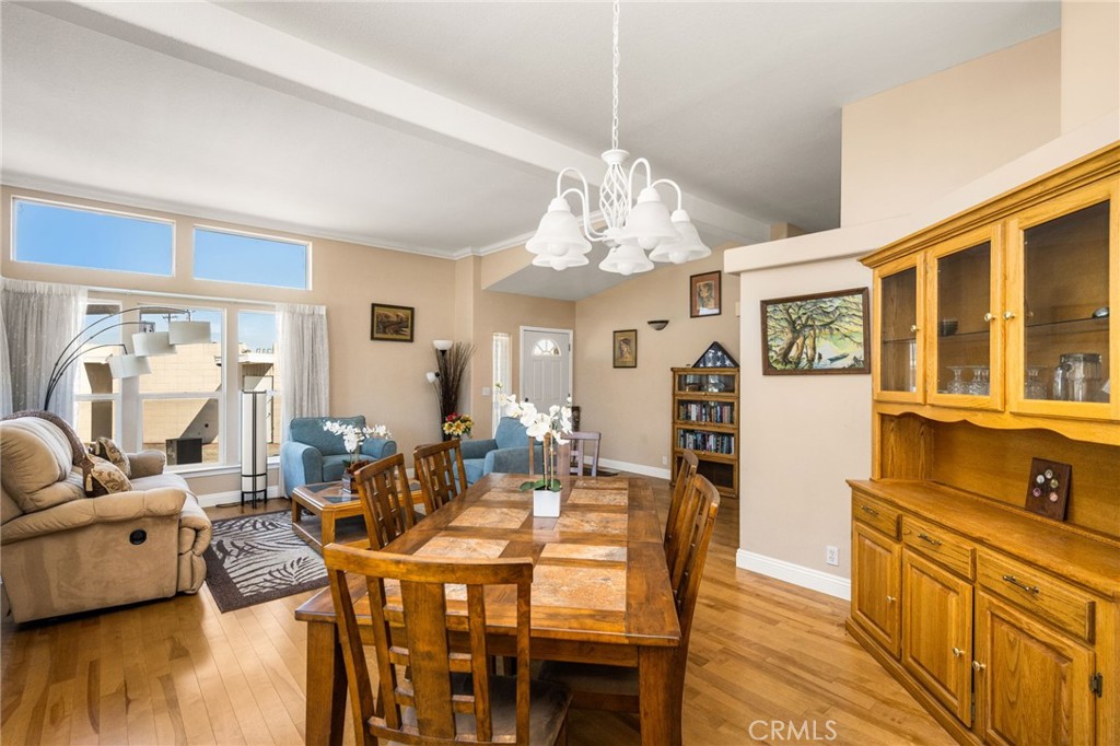 View of the Dining Space & Family Room from Kitchen access. - 70 Cherry, Anaheim CA 92801 - photo 12
