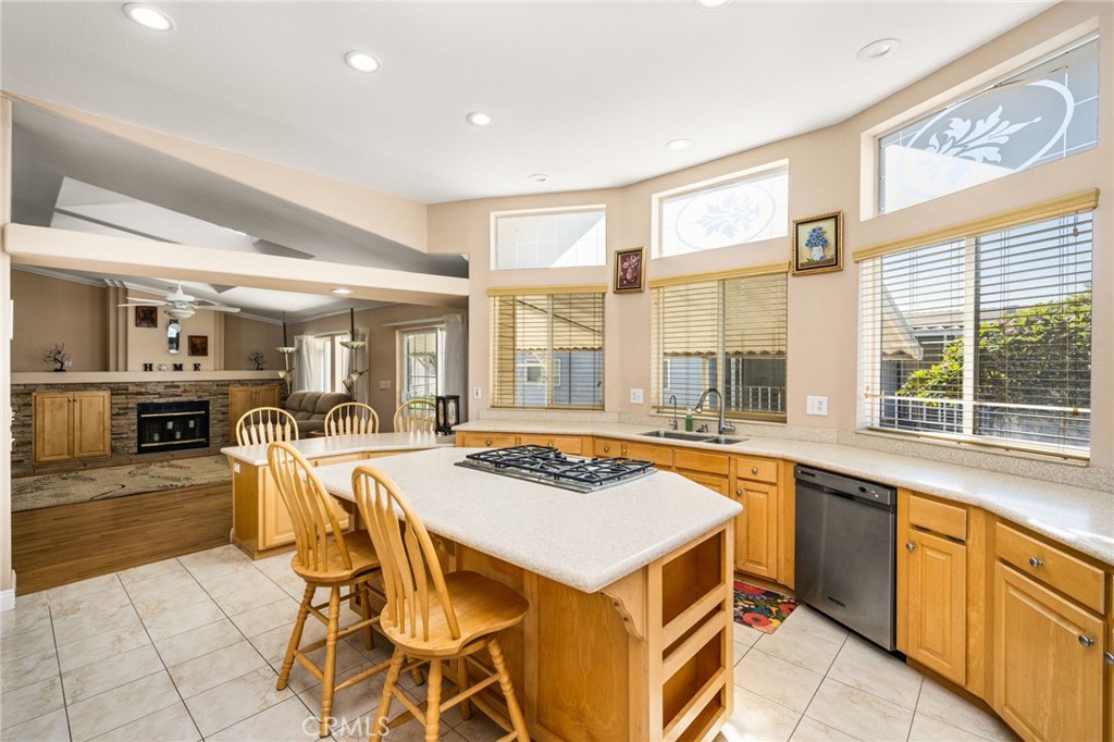 View of the Kitchen & Living Room as you enter from the Family Room side. - 70 Cherry, Anaheim CA 92801 - photo 25