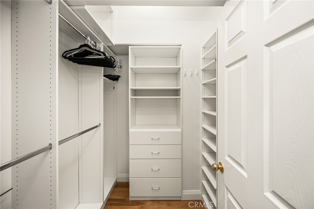 Primary Bedroom's Walk-In Closet with Built-In organizers. - 70 Cherry, Anaheim CA 92801 - photo 35