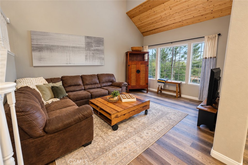 Living Room with high ceilings and beautiful view - 740 S Crown Pointe, Anaheim CA 92807 - photo 4