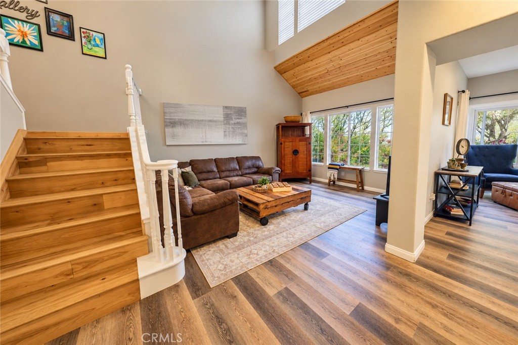 Living Room with high ceilings and beautiful view - 740 S Crown Pointe, Anaheim CA 92807 - photo 5