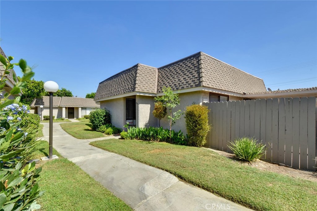 Welcome home! Walk this path and enjoy the beautiful landscape everyday coming home. - 819 S Coventry Drive, Anaheim CA 92804 - photo 1