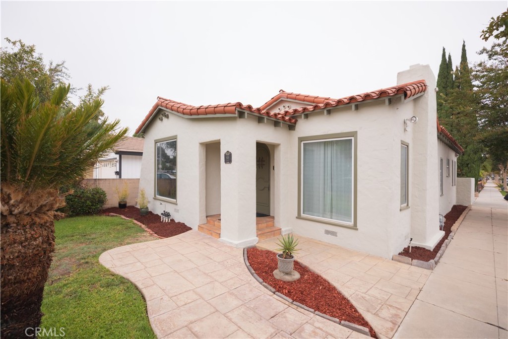 This lovely Spanish Style Home really delivers! - 848 S Lemon, Anaheim CA 92805 - photo 1