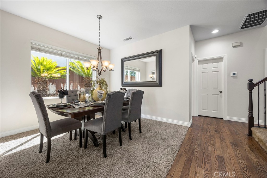 Separate dining room with wine refrigerator and storage in cabinet across from it, - 8751 E Running Springs Drive, Anaheim Hills CA 92808 - photo 14