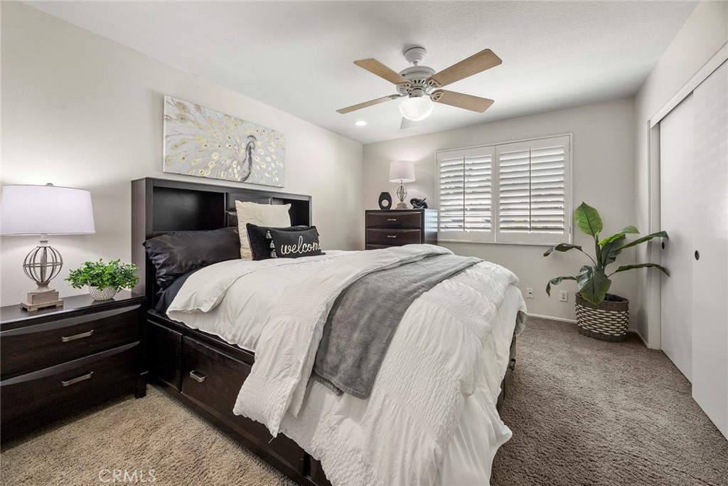 Large front bedroom with triple closet space. - 8751 E Running Springs Drive, Anaheim Hills CA 92808 - photo 18