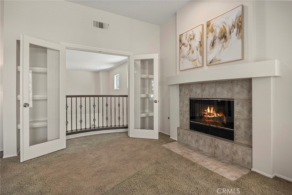 French doors opening to balcony overlooking the entry and living room - 8751 E Running Springs Drive, Anaheim Hills CA 92808 - photo 22