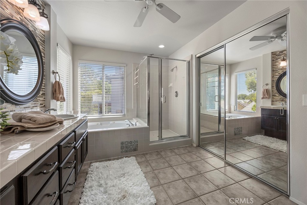 Spa tub, and walk-in closet with plenty of room in Primary bathroom. - 8751 E Running Springs Drive, Anaheim Hills CA 92808 - photo 24
