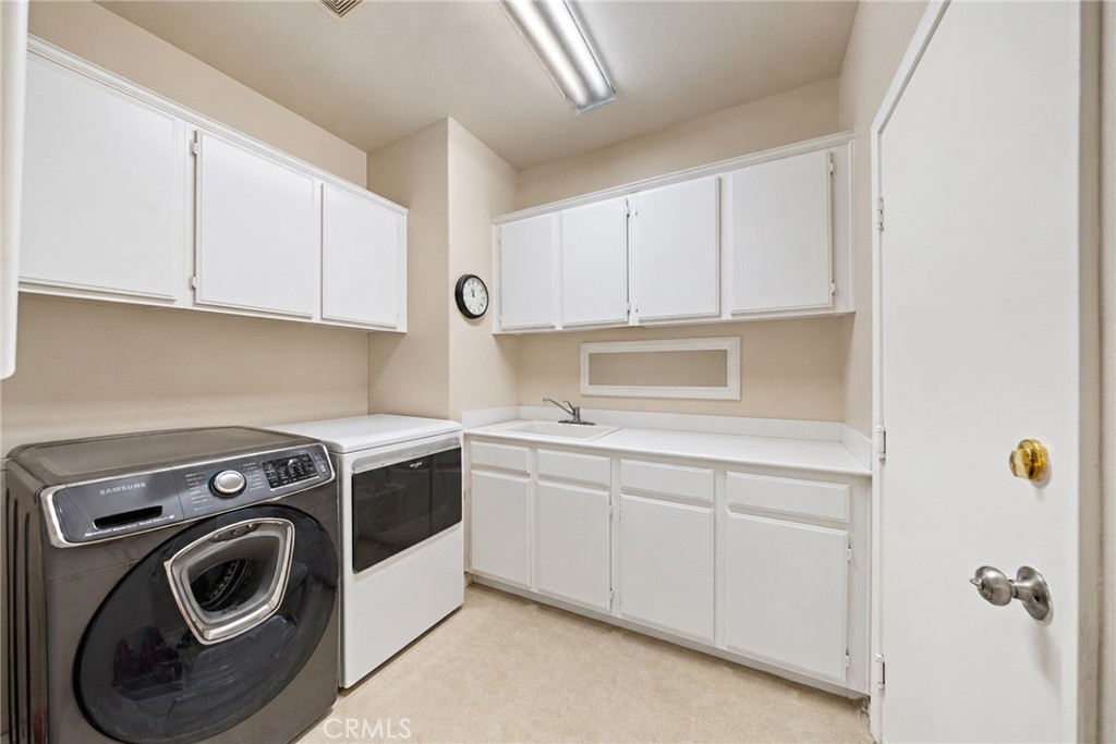 Laundry Room - 8765 E Banner Ridge, Anaheim CA 92808 - photo 31