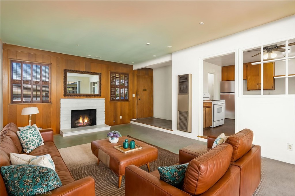 Main living room virtually staged for conceptual reference - 8805 Stardust Lane, Anaheim CA 92804 - photo 11