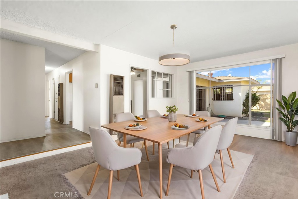 Main dining room virtually staged for conceptual reference - 8805 Stardust Lane, Anaheim CA 92804 - photo 12