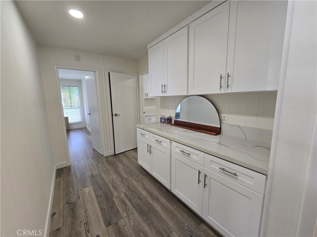 Hallway with storage cabinets - 1051 Site Dr 112, Brea CA 92821 - photo 11