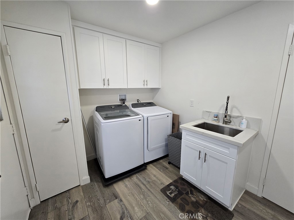 Laundry Room with utility sink - 1051 Site Dr 112, Brea CA 92821 - photo 18