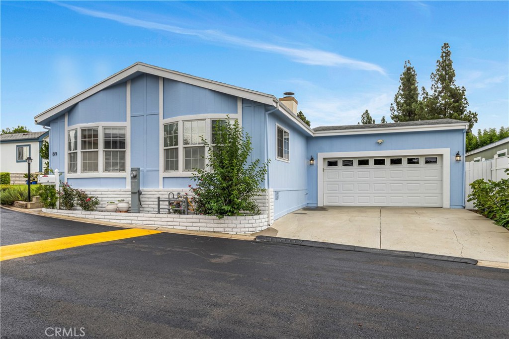 Crestmont Mobile Estates - Beautiful, updated, with rare two-car attached garage, 3 Bedroom, 2 Full Bath, 1,400 Sq Ft Li - 1051 Site Drive 89, Brea CA 92821 - photo 1