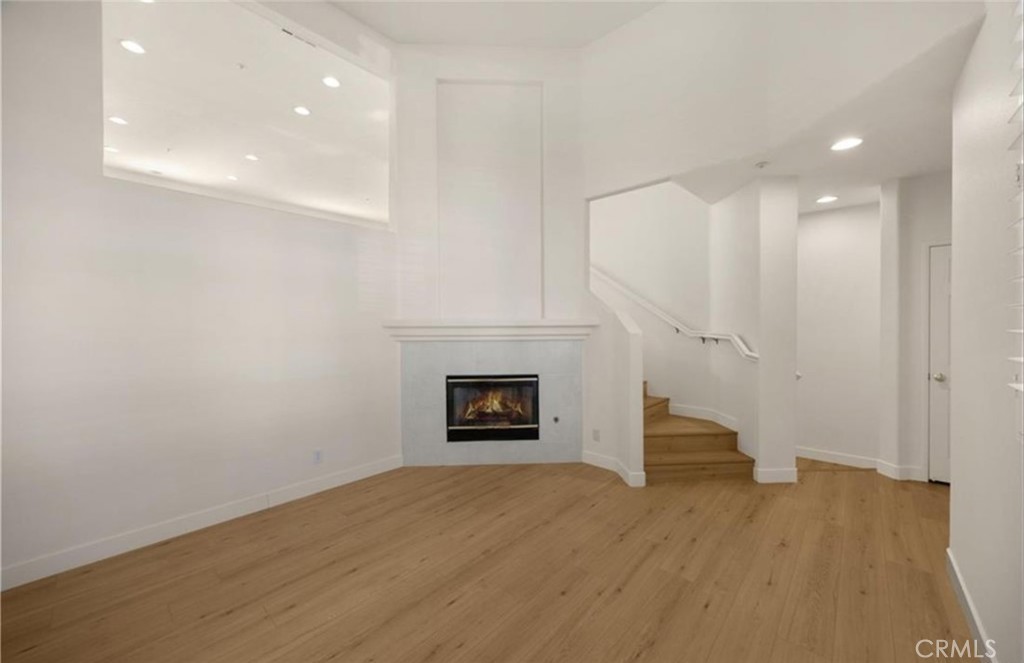 Cozy fireplace in main level living room - 123 S Orange Ave, Brea CA 92821 - photo 8