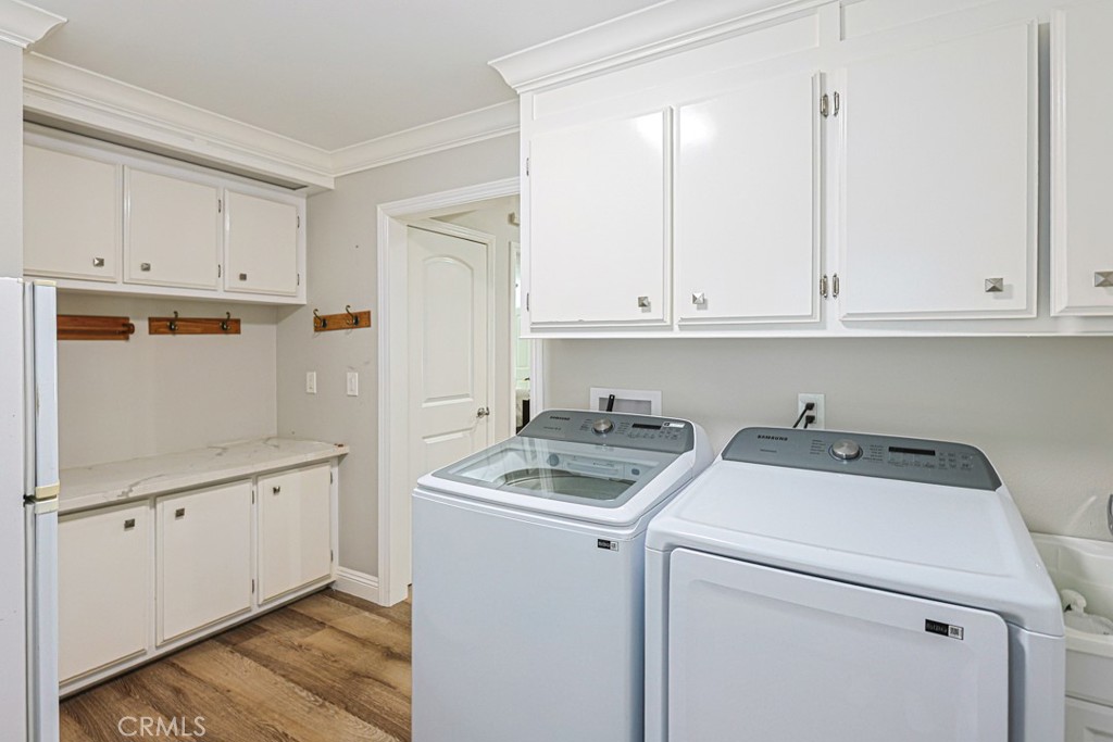 Laundry room with sheves - 1361 Canyon Lake 58, Brea CA 92821 - photo 22
