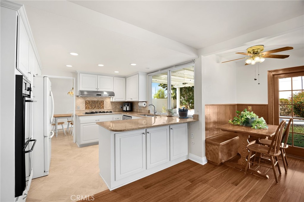 Showing eating area and kitchen to the left - 1811 Ravencrest, Brea CA 92821 - photo 7