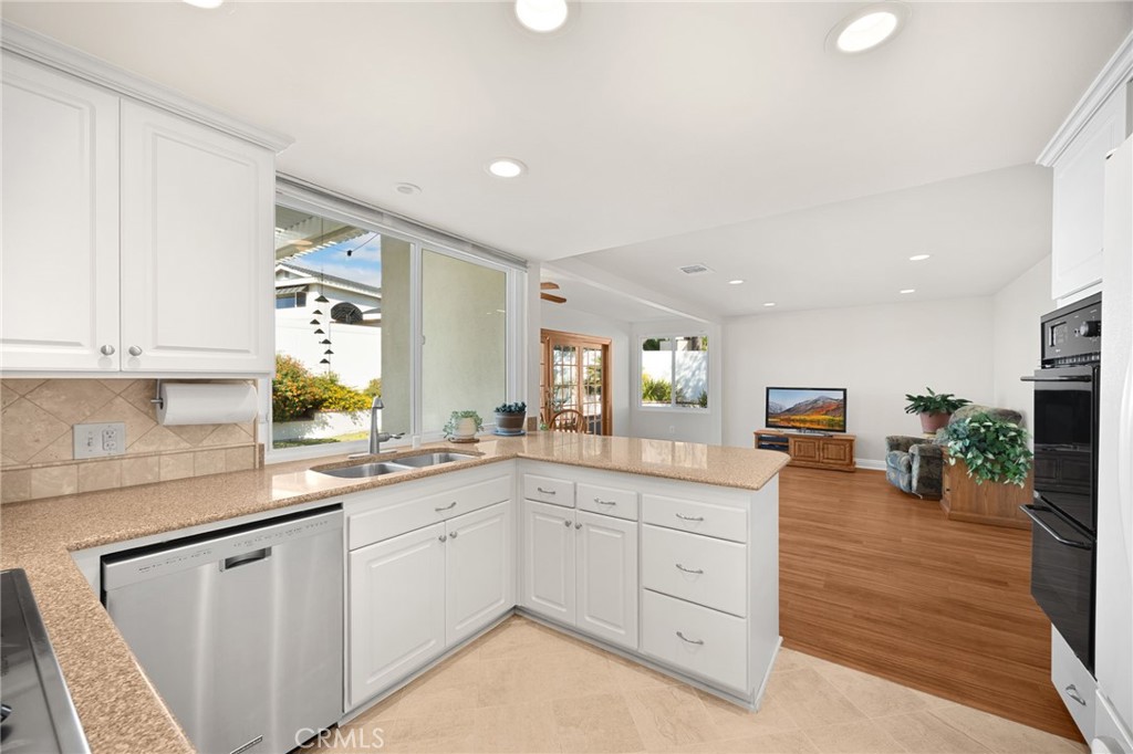 View from entrance of dining room into family room - 1811 Ravencrest, Brea CA 92821 - photo 11