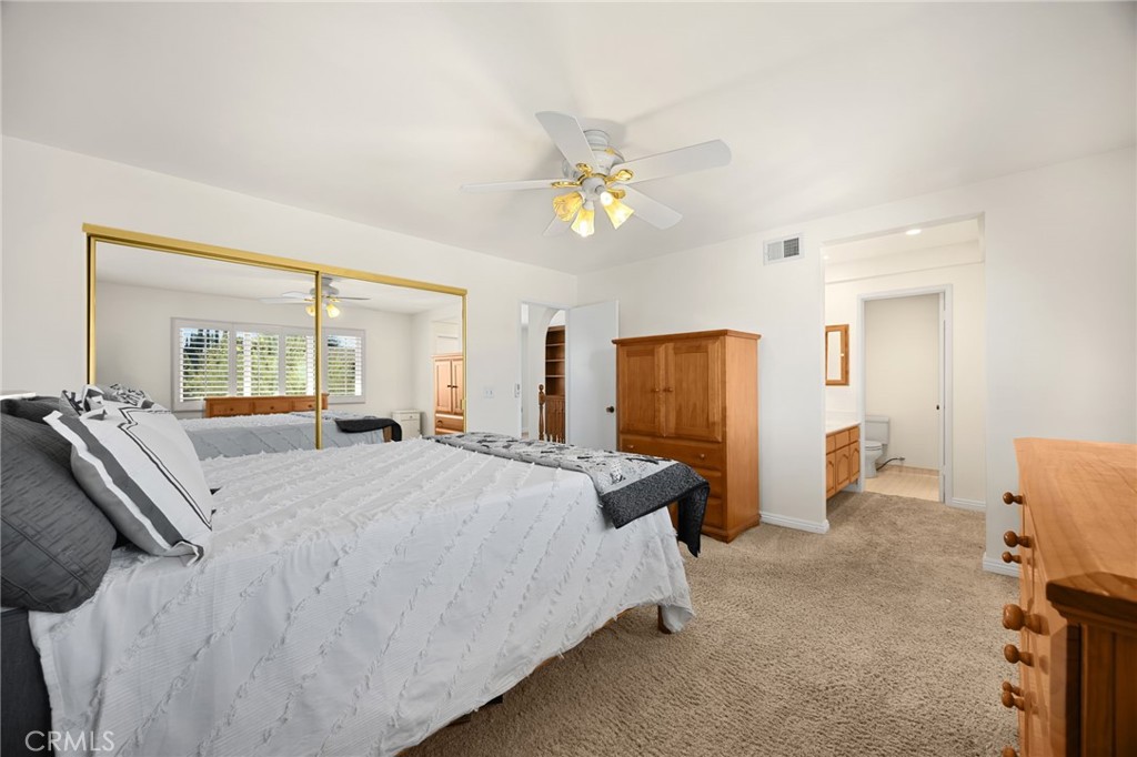 Master Bedroom showing entrance to bathroom - 1811 Ravencrest, Brea CA 92821 - photo 22