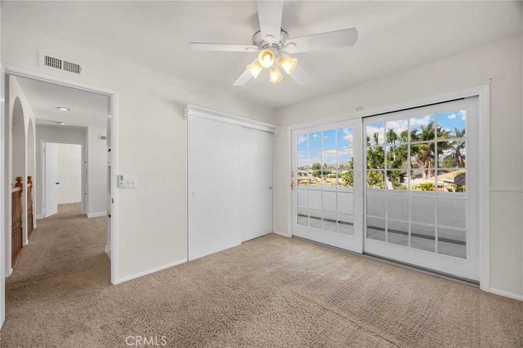 Bedroom 3 with balcony - 1811 Ravencrest, Brea CA 92821 - photo 25