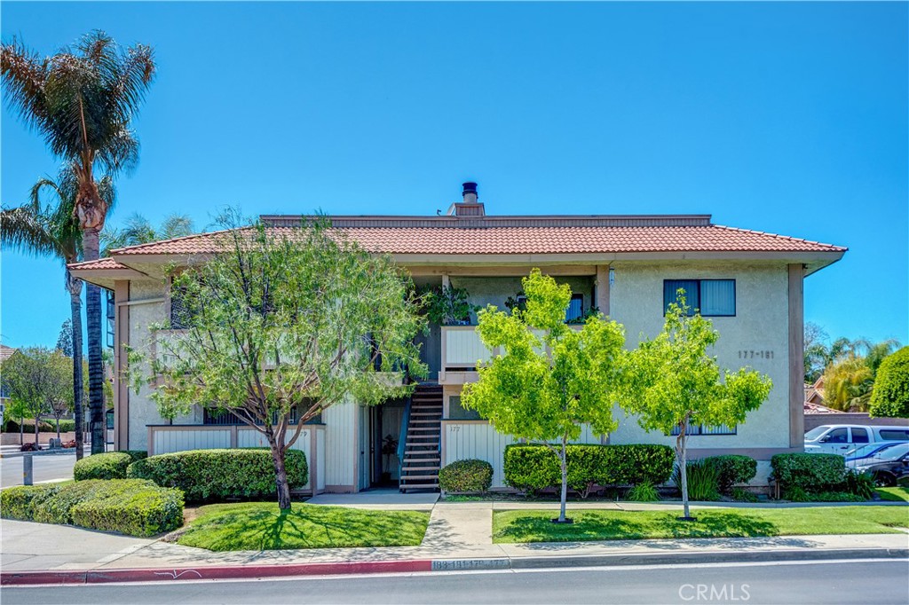 183 S. Poplar Brea. This upstairs, end unit is a way to get into the market! - 183 S Poplar Avenue 7, Brea CA 92821 - photo 1