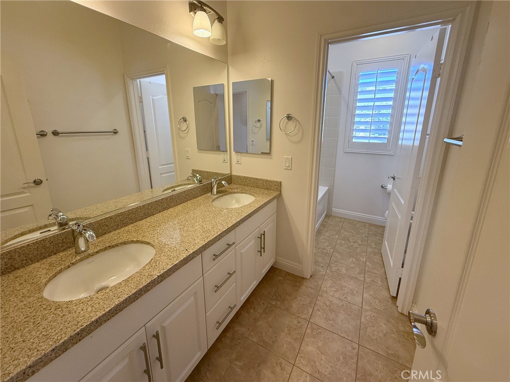 Photo modified: Upstairs shared bathroom. - 2700 E Coalinga Drive, Brea CA 92821 - photo 17