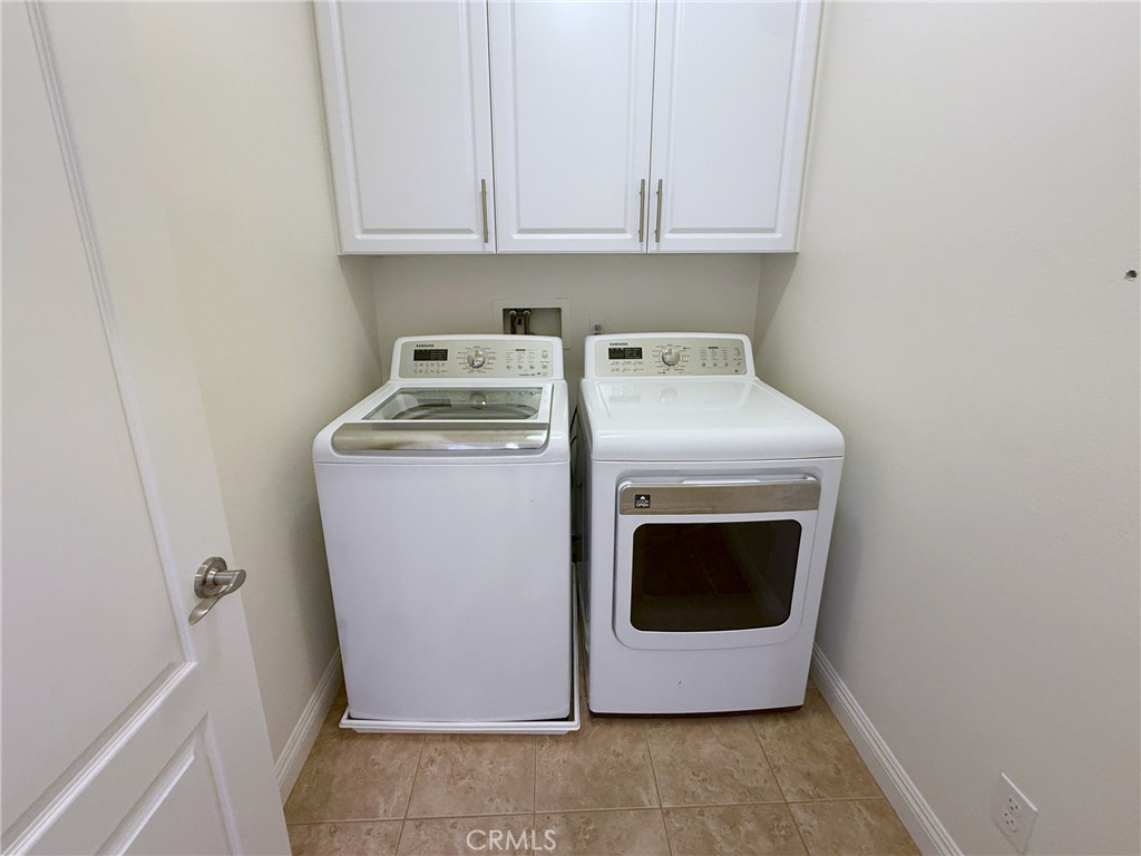 Upstairs laundry room; appliance inclusion subject to confirmation - 2700 E Coalinga Drive, Brea CA 92821 - photo 19