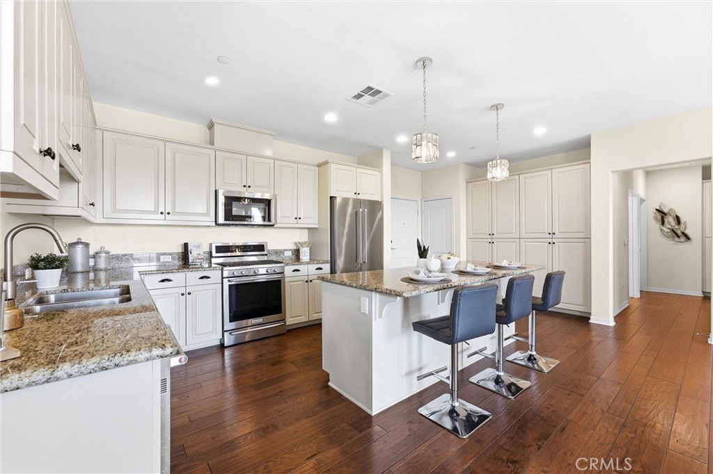 Light and Bright Kitchen with ample cabinet space and breakfast bar - 408 Maravilla, Brea CA 92823 - photo 1