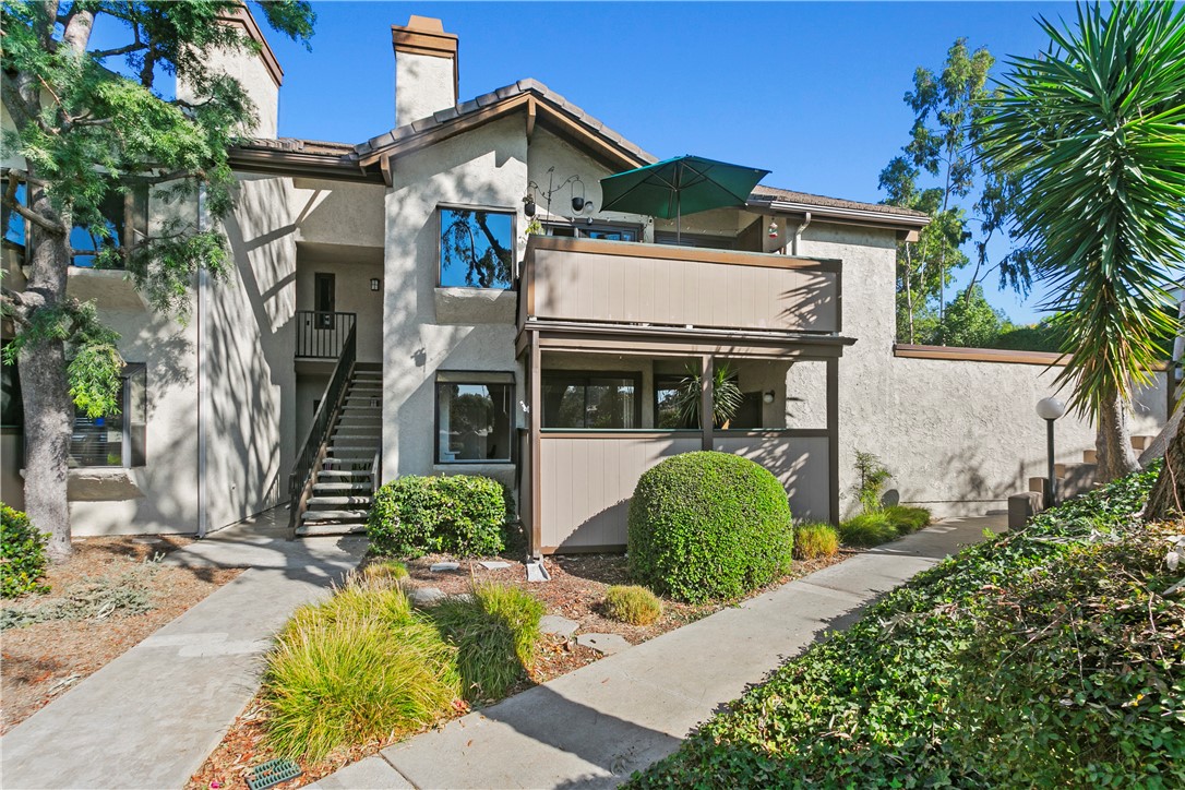Ground level home with a premium private location in the coveted Brea Canyon Villas - 520 N Brea Boulevard 1, Brea CA 92821 - photo 1