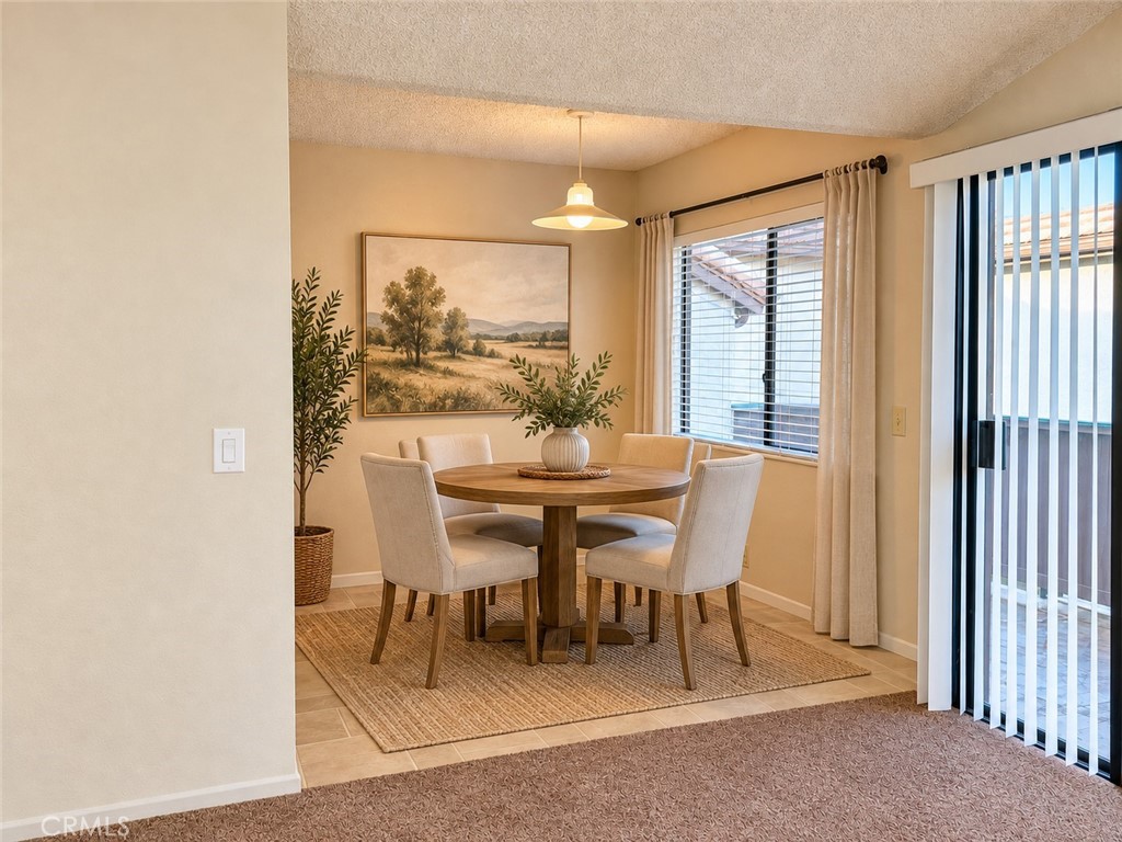Dining Area Virtually Staged - 600 N Brea Boulevard 44, Brea CA 92821 - photo 7