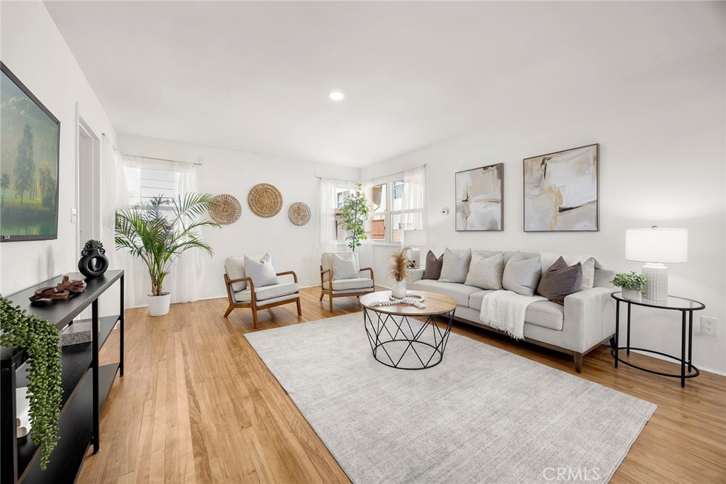 Single Family Home. Freshly painted and beautiful refinished wood floors. - 719 S Walnut, Brea CA 92821 - photo 1