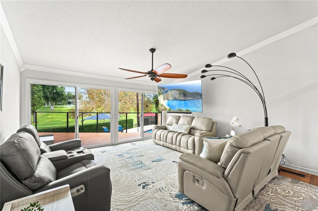 Family room overlooking the golf course - 5431 Rockledge Drive, Buena Park CA 90621 - photo 20