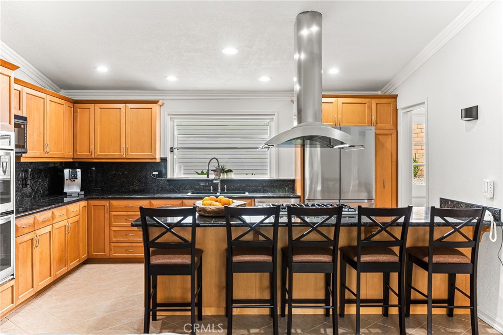 Kitchen with custom cabinets - 5431 Rockledge Drive, Buena Park CA 90621 - photo 22