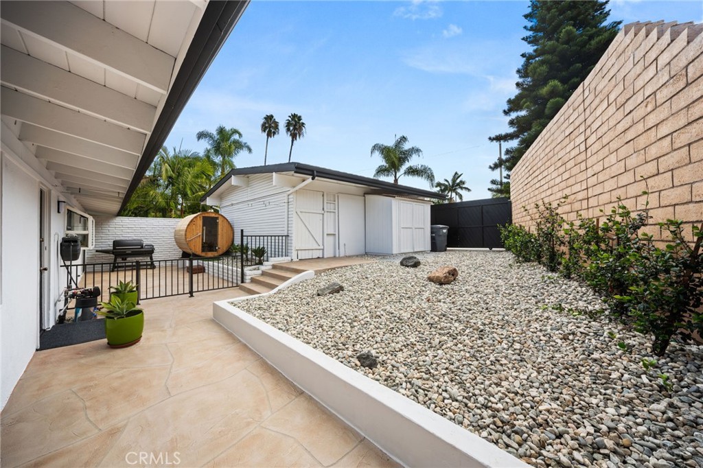 New river rocks for low maintenance landscaping - 5431 Rockledge Drive, Buena Park CA 90621 - photo 48