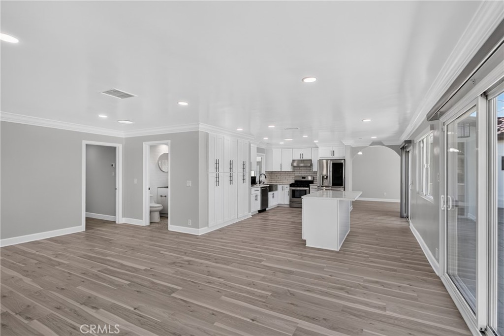 Open floor plan with newer paint and flooring - 5451 Lockhaven Drive, Buena Park CA 90621 - photo 17