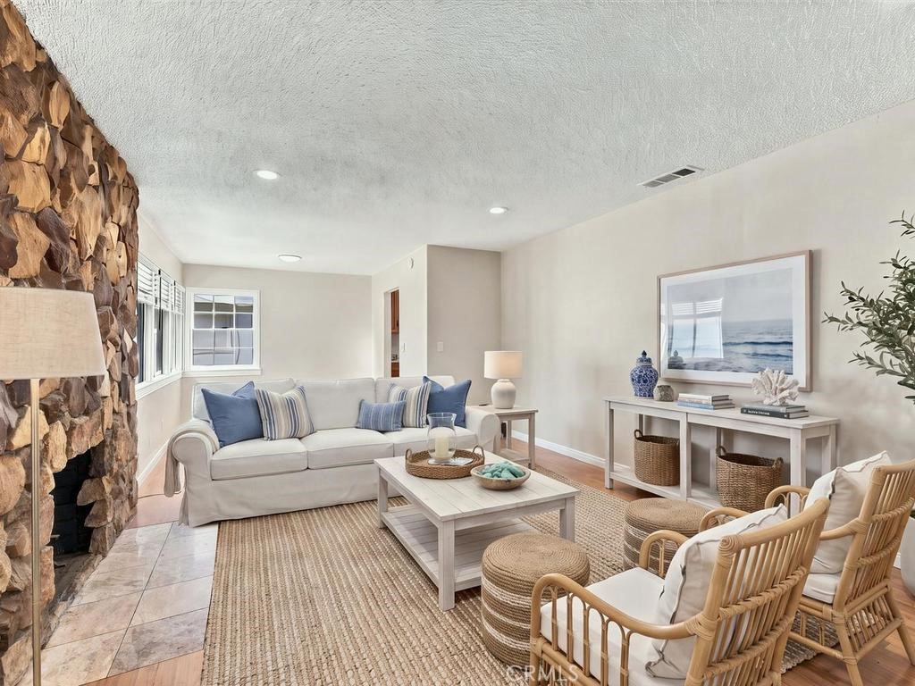living room virtually staged - 6555 San Alano Circle, Buena Park CA 90620 - photo 12
