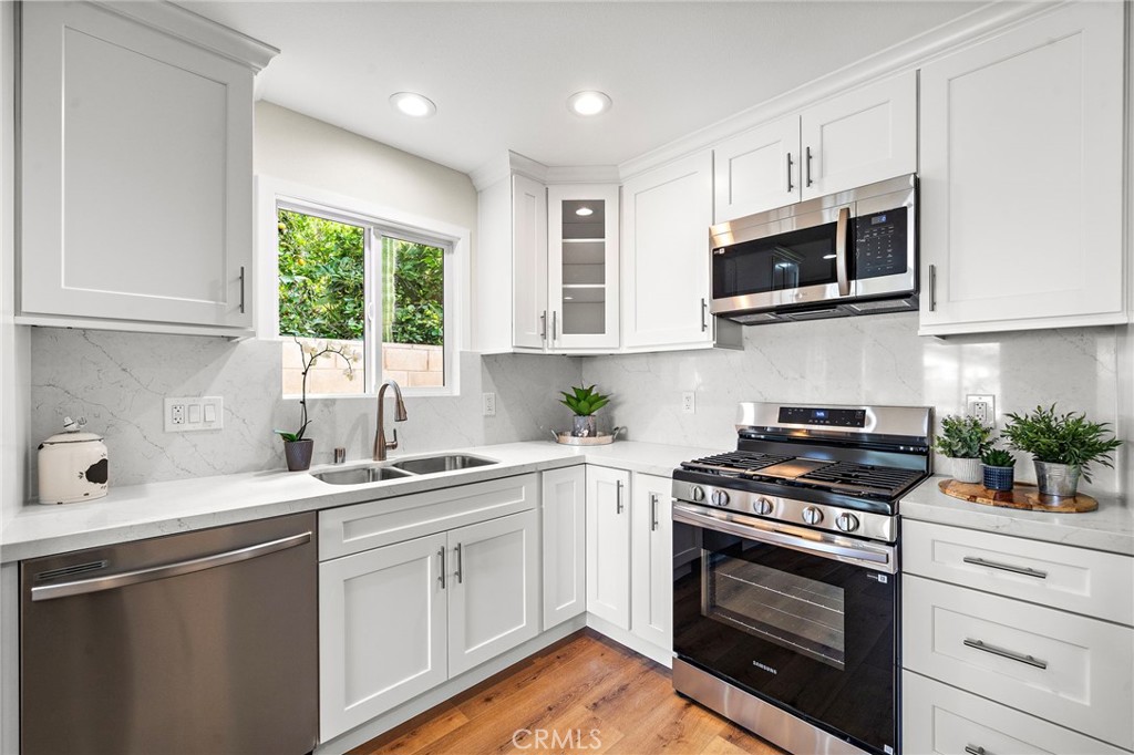 Gorgeous kitchen with new custom cabinets and all new appliances - 6916 Houston, Buena Park CA 90620 - photo 7