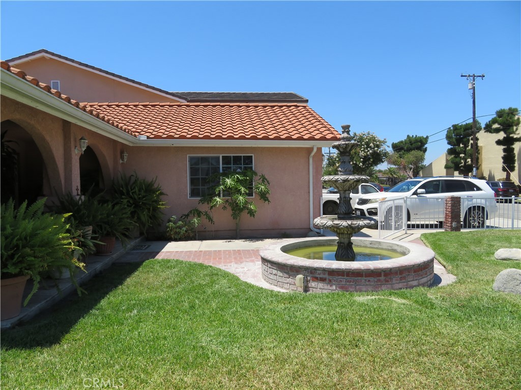 Front yard with fountain - 6996 Naomi Avenue, Buena Park CA 90620 - photo 1