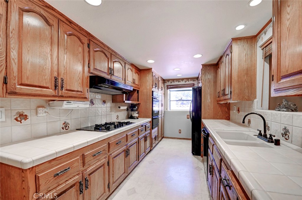 Upgraded Kitchen with garden window - 7660 El Chaco, Buena Park CA 90620 - photo 7