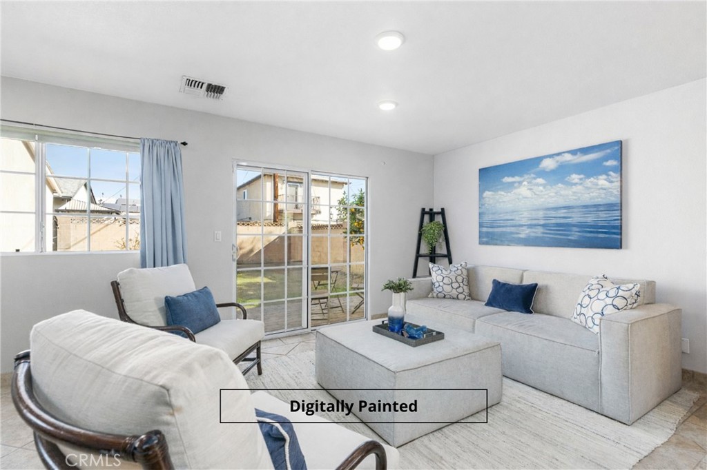 Welcome to Buena Park living! Photo digitally painted on 1 wall. - 7666 Lilac Cir, Buena Park CA 90620 - photo 1