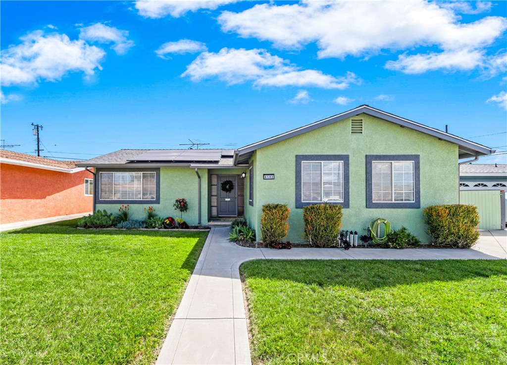 Freshly painted, textured glass sidelights, and charming cul-de-sac. - 8102 San Hilario Circle, Buena Park CA 90620 - photo 1