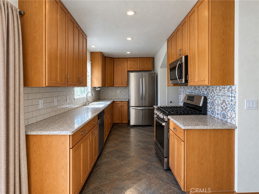 Kitchen - 8180 Ferguson Green, Buena Park CA 90621 - photo 10