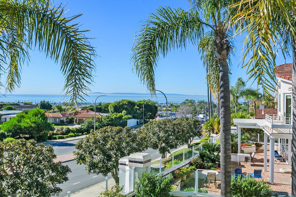 Catalina view from your primary bedroom, even with some morning fog! - 19 Harbor Pointe, Corona Del Mar CA 92625 - photo 8