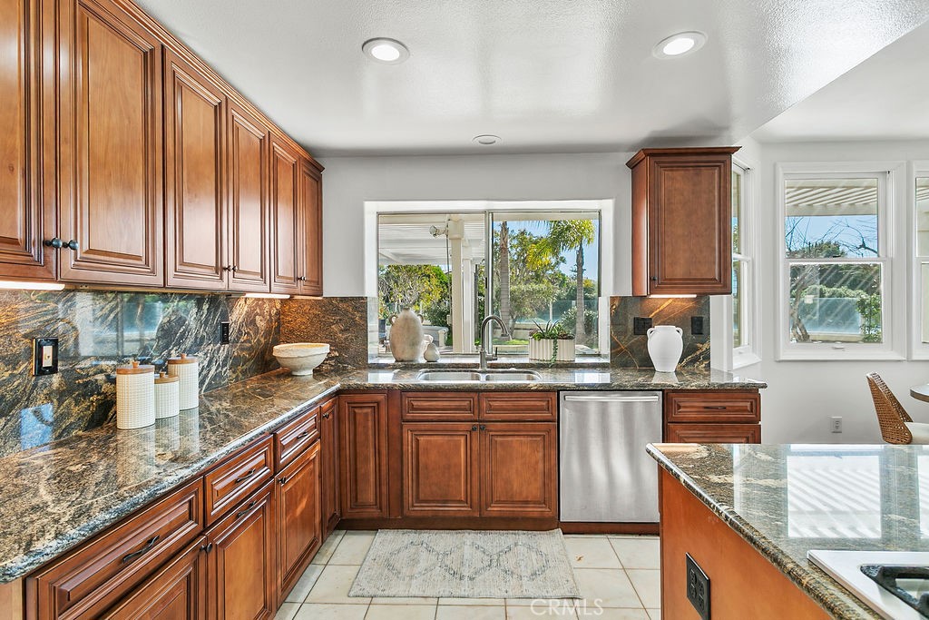 Lots of granite counter space. - 19 Harbor Pointe, Corona Del Mar CA 92625 - photo 24