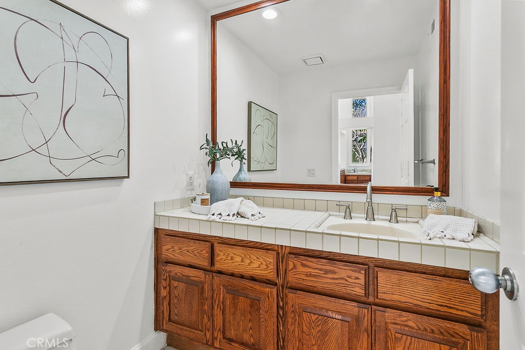 Convenient downstairs guest bathroom - 19 Harbor Pointe, Corona Del Mar CA 92625 - photo 25