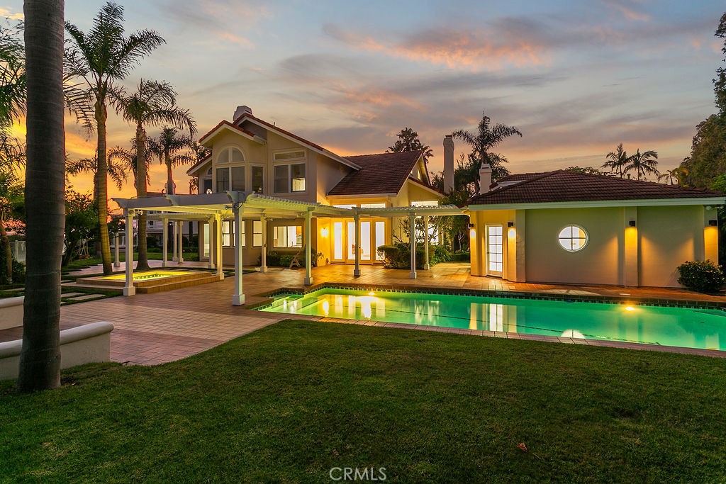 Main house, pool house, pool and spa from a back lawn. - 19 Harbor Pointe, Corona Del Mar CA 92625 - photo 38