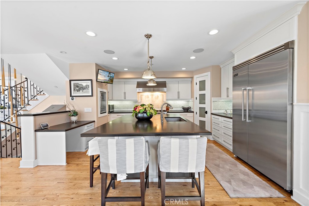 Gourmet kitchen with large island and top of the line appliances and materials - 212 Marguerite Avenue, Corona Del Mar CA 92625 - photo 12