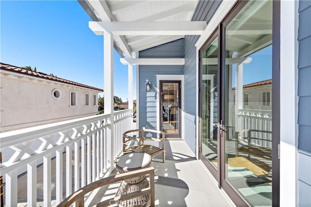 Sunny balcony off primary suite. - 212 Marguerite Avenue, Corona Del Mar CA 92625 - photo 18
