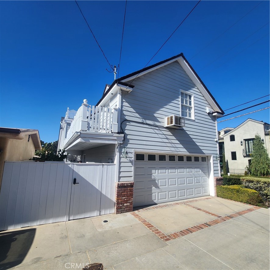 Private secured entry from the alley includes two car garage. - 232 Jasmine, Corona Del Mar CA 92625 - photo 3