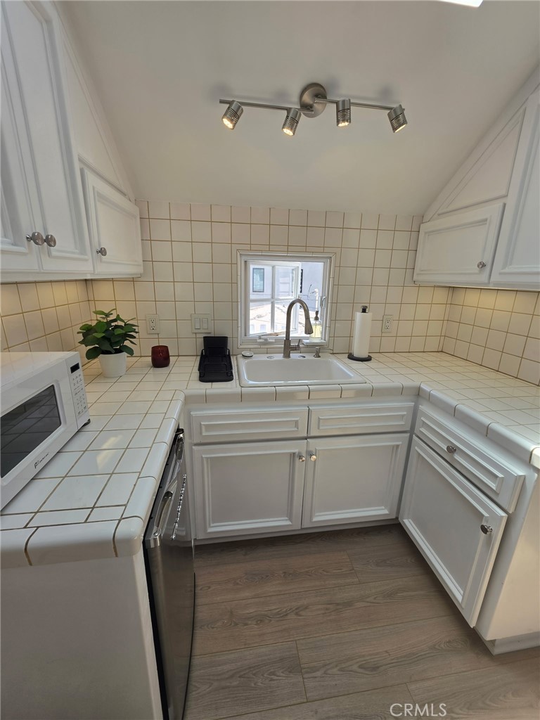 Kitchenette located in the third bedroom suite - 232 Jasmine, Corona Del Mar CA 92625 - photo 23